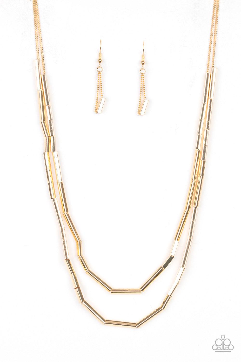 Paparazzi Accessories A Pipe Dream - Gold A collection of square rods slide along two dainty gold chains below the collar, creating edgy metallic layers. Features an adjustable clasp closure. Jewelry