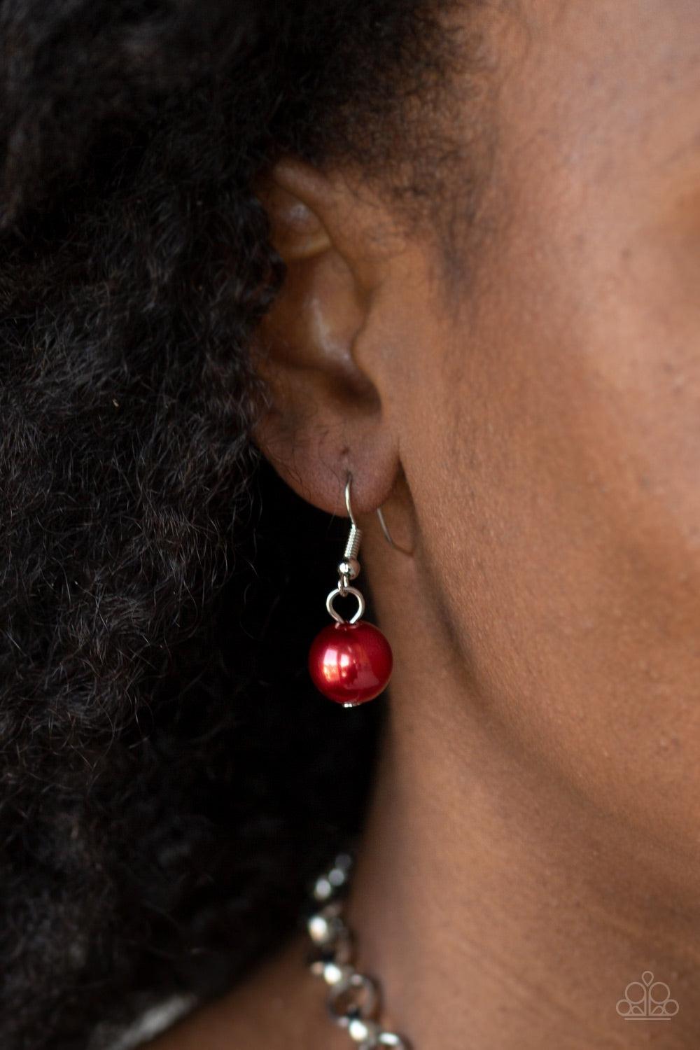 Paparazzi Accessories One-Way WALL Street - Red A collision of mismatched silver chains layer below the collar. Oversized red pearls dangle from the lowermost chain, creating a dramatically refined fringe for a statement-making finish. Features an adjusta