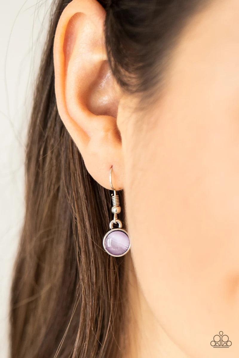Paparazzi Accessories Inner Illumination - Purple Encased in antiqued silver fittings, dainty white rhinestones and glowing Amethyst Orchid cat's eye stones delicately link below the collar for a timeless finish. Features an adjustable clasp closure. Sold