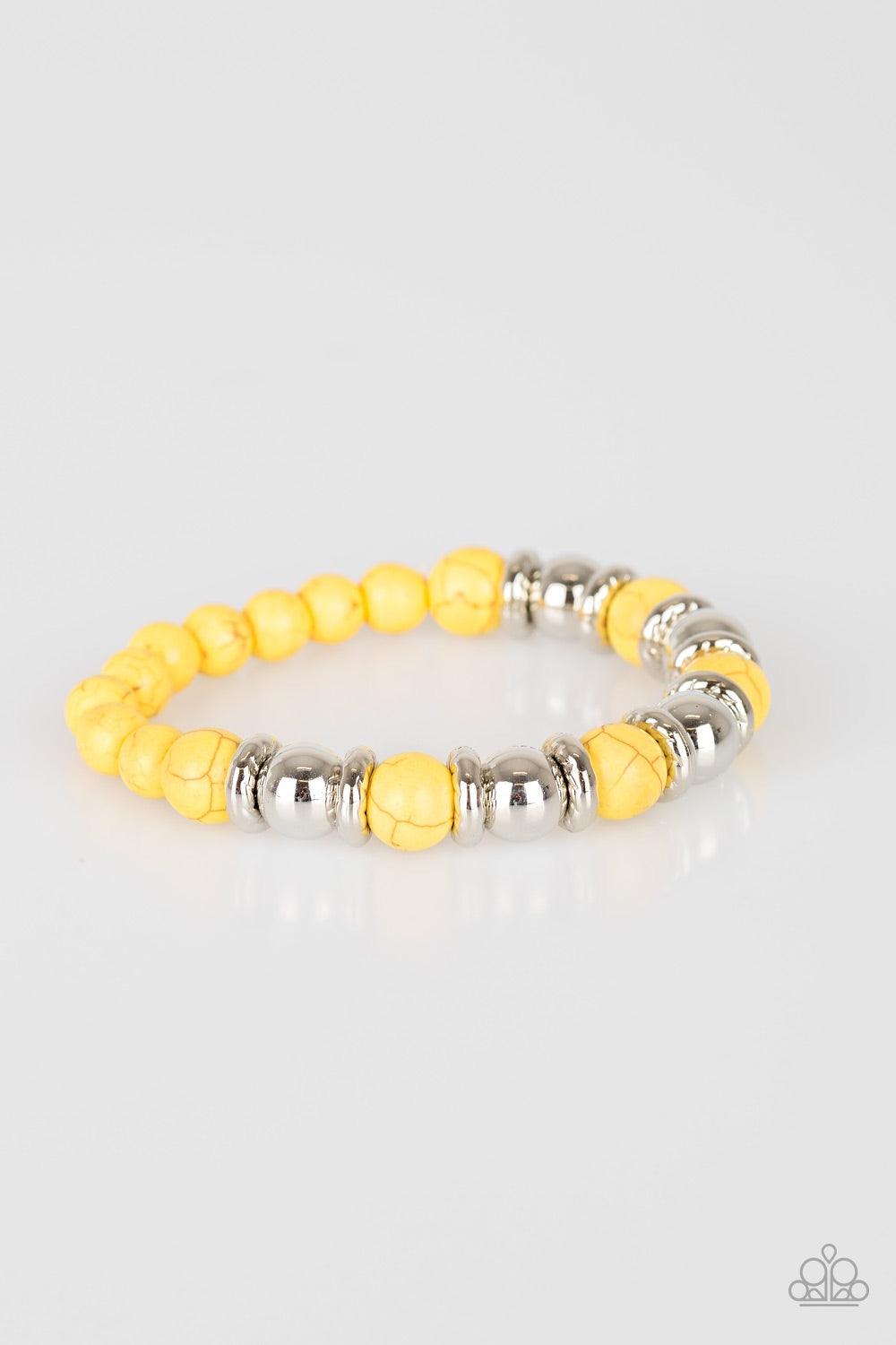 Paparazzi Accessories Across The Mesa - Yellow A collection of silver accents and sunny yellow stones are threaded along a stretchy band for a seasonal look. Jewelry