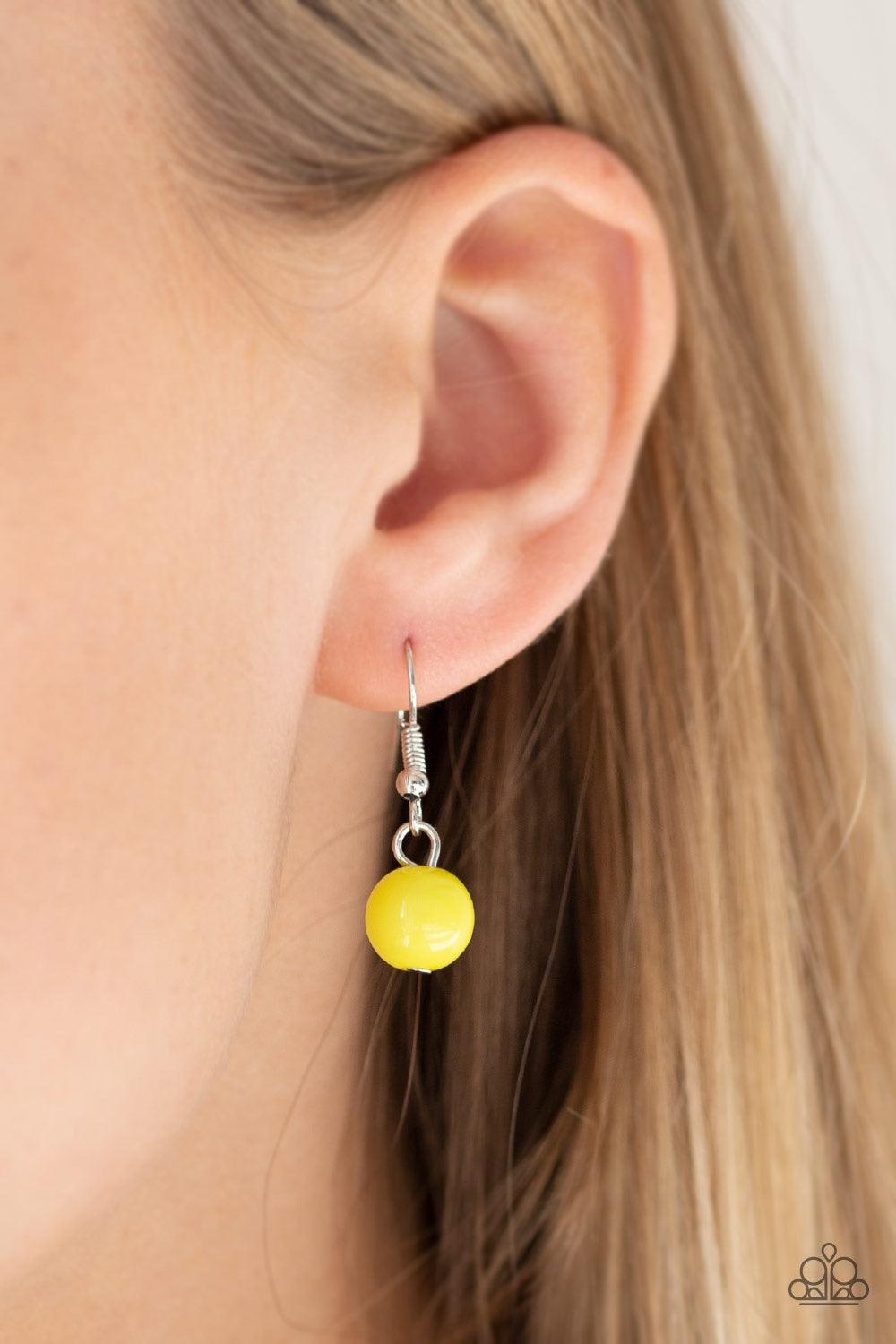 Paparazzi Accessories Daytime Drama - Yellow Gradually increasing in size near the center, a collection of yellow, silver, and cloudy beads join below the collar in a statement making fashion. Features an adjustable clasp closure. Jewelry