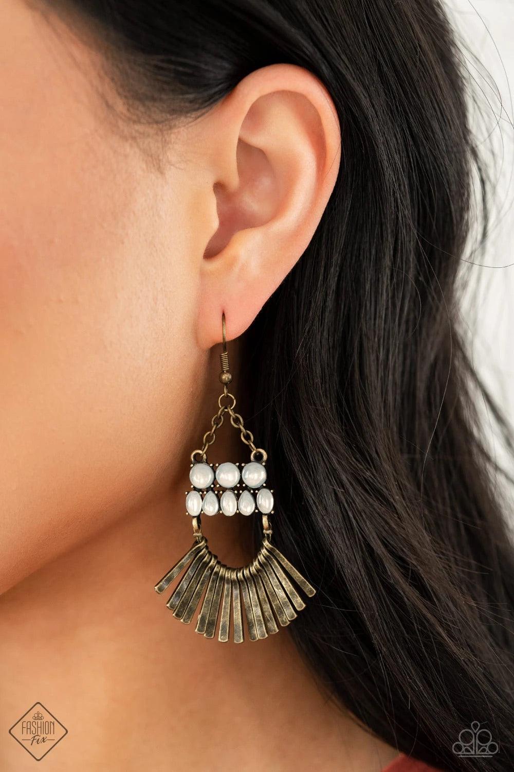 Paparazzi Accessories A FLARE For Fierceness - Brass A row of delicately hammered brass rods fans out along a dainty brass wire that attaches to the bottom of stacked rows of opalescent white beads. The mismatched rows of dewy beads swing from the bottom