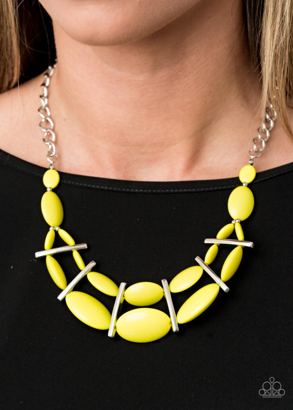 Paparazzi Accessories Law of the Jungle - Yellow Sectioned off by edgy silver fittings, a flamboyant collection of rebellious Green Sheen beads link into two colorful layers below the collar for a bold pop of color. Features an adjustable clasp closure. J