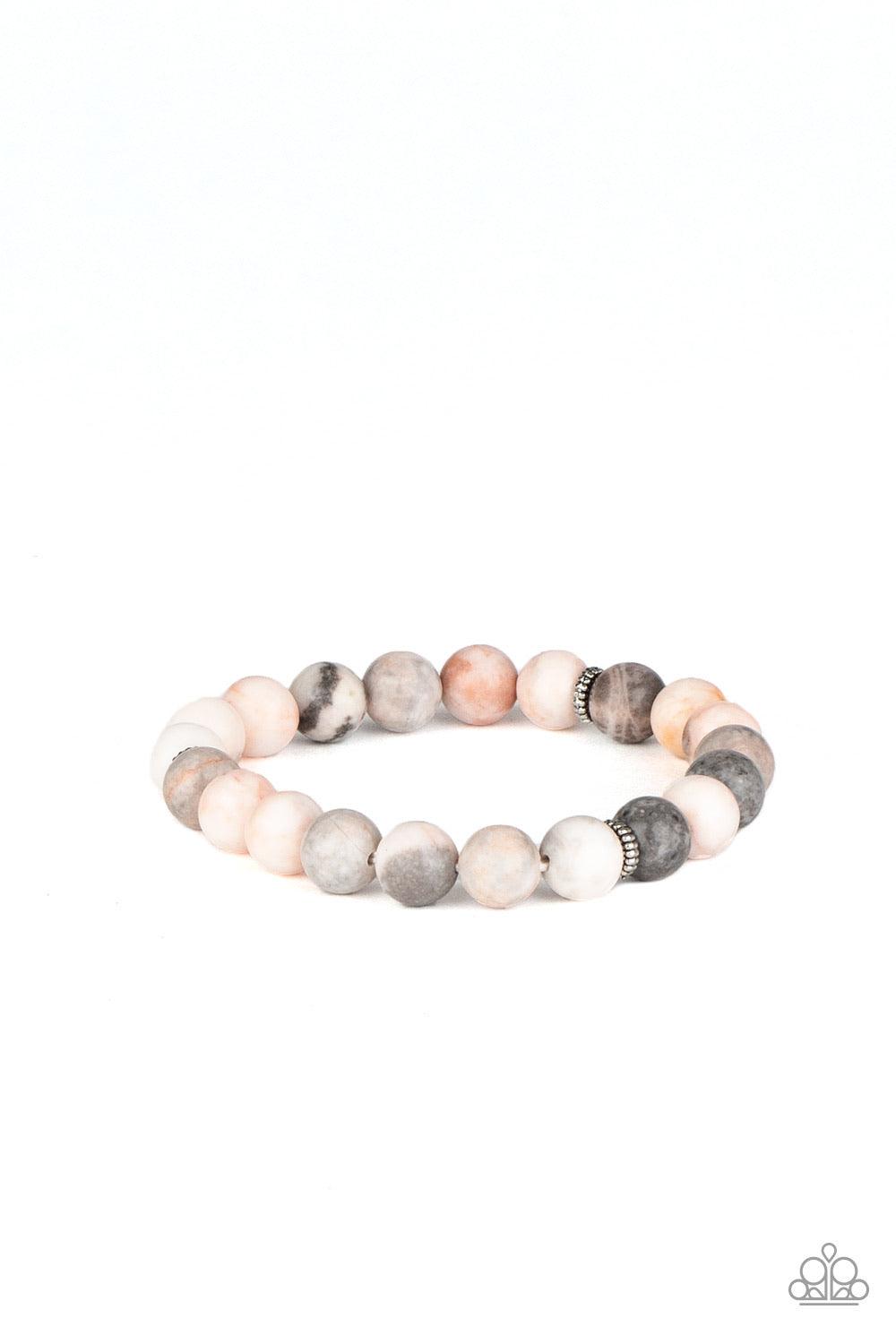 Paparazzi Accessories Invigorated - Pink Infused with dainty silver beads, a collection of refreshing pink, gray, and white stones are threaded along a stretchy band around the wrist for an earthy flair. As the stone elements in this piece are natural, so