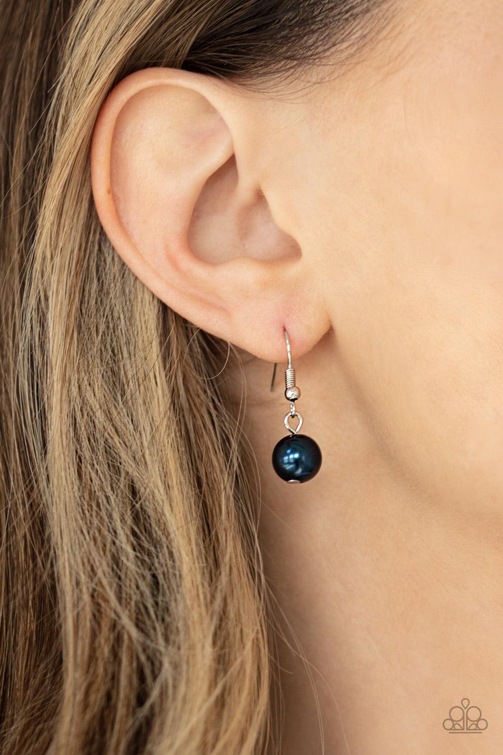 Paparazzi Accessories Rich Girl Refinement - Blue Infused with dainty white rhinestone encrusted rings, a collection of oversized blue pearls and sparkling white rhinestone encrusted beads are threaded along an invisible wire below the collar for a refine