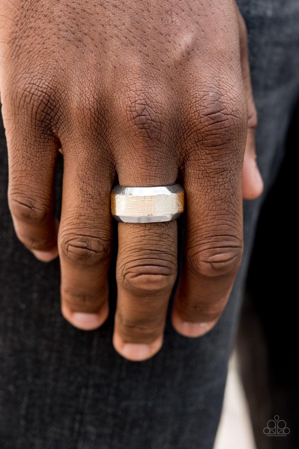 Paparazzi Accessories Checkmate - Multi The center of a beveled silver band has been delicately hammered in shimmery gold detail for a metro inspired look. Features a stretchy band for a flexible fit. Jewelry