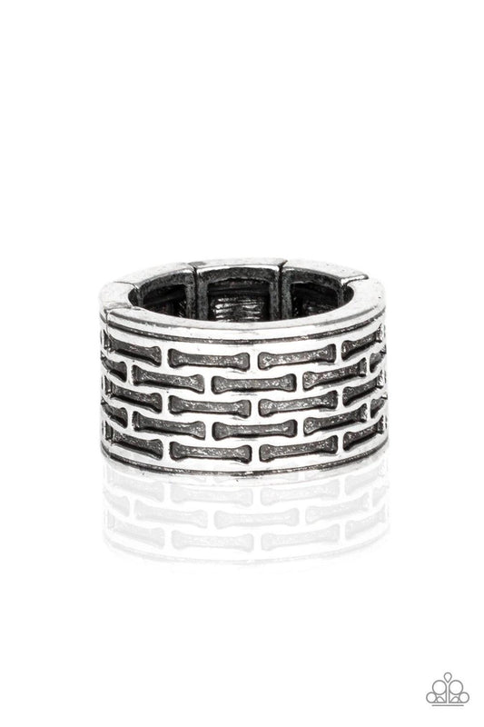 Paparazzi Accessories Tactical Gear - Silver Brushed in an antiqued finish, abstract bar-like patterns are stamped across the front of a thick silver band for a casual look. Features a stretchy band for a flexible fit. Sold as one individual ring. Jewelry
