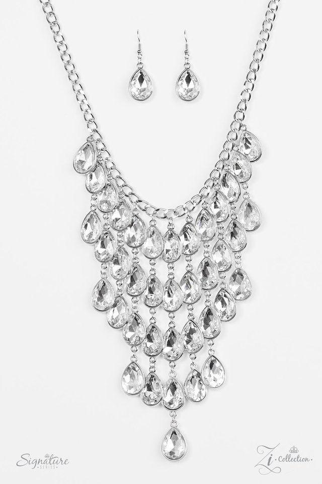 Paparazzi Accessories The Shanae Glittery white gems are pressed into silver teardrop frames, creating a gorgeous tapered fringe below the collar as the sparkling drops link together in vertical rows of blinding shimmer. Features an adjustable clasp closu
