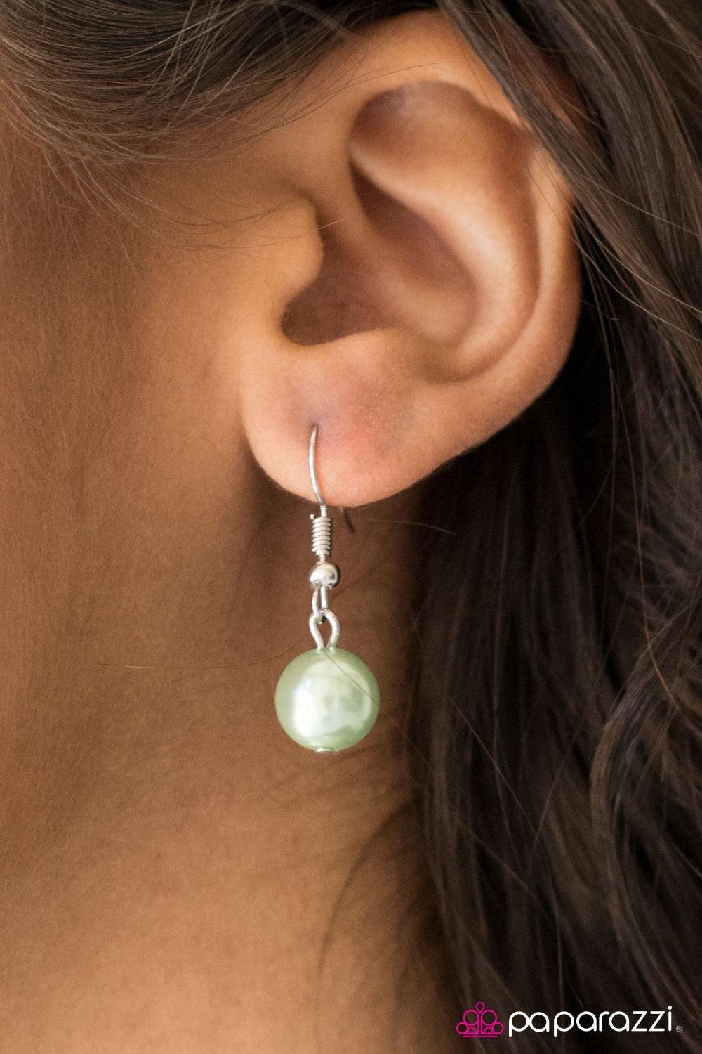 Paparazzi Accessories I Can SEA Clearly Now - Green Two rows of green pearls fall just below the collar, creating rows of cascading elegance. Dainty crystal beads are sprinkled along the pearlescent layers, adding glittering accents to the feminine palett