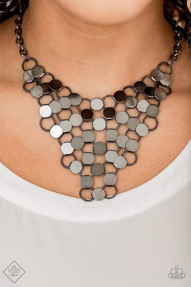 Paparazzi Accessories Net Result - Black An interlocking net of textured gunmetal rings and reflective gunmetal discs link into a dramatically netted fringe below the collar. Features an adjustable clasp closure. Jewelry