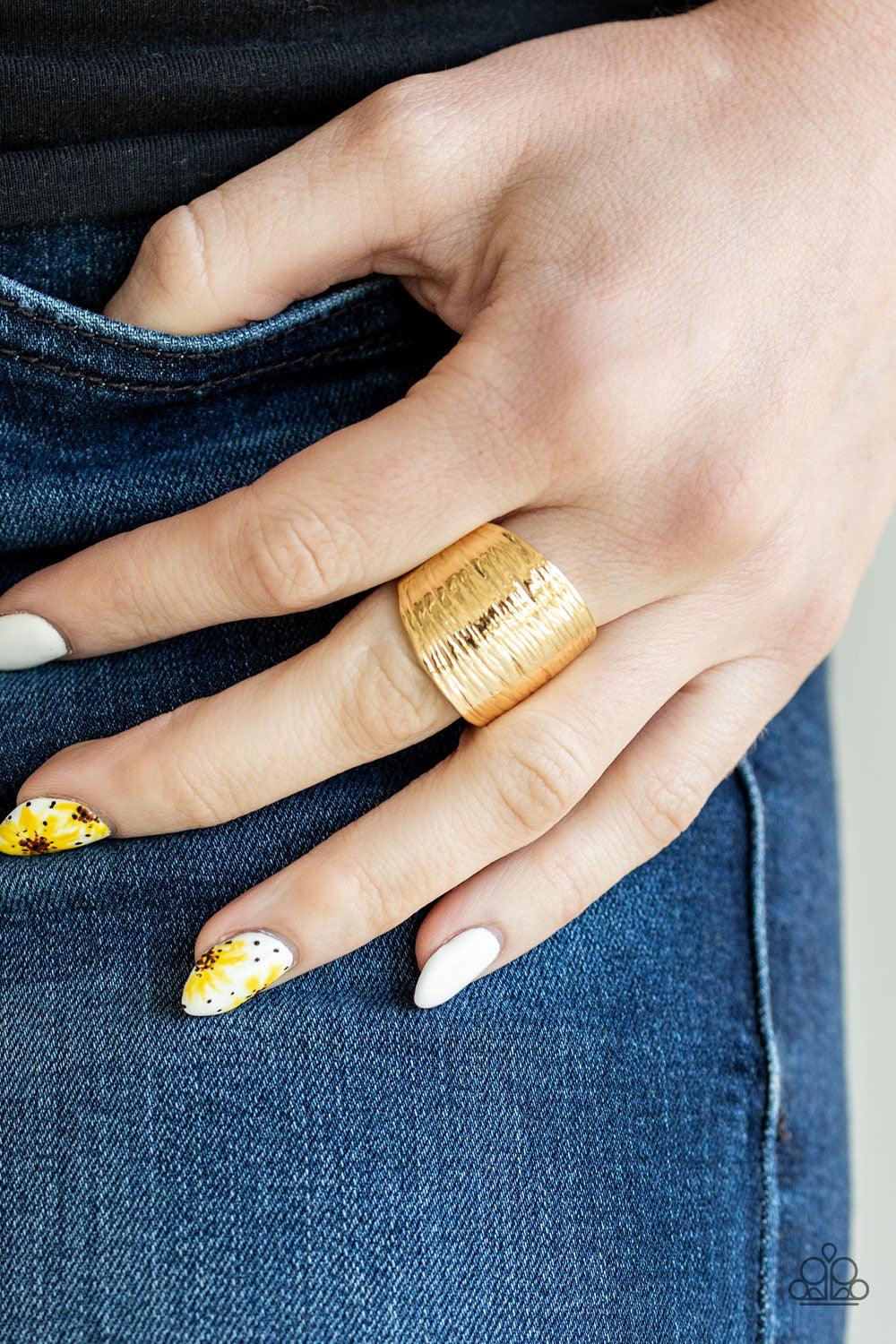 Paparazzi Accessories Rippling Rivers ~Gold Rippling with linear textures, a thick gold frame curls around the finger for a casual look. Features a stretchy band for a flexible fit.
