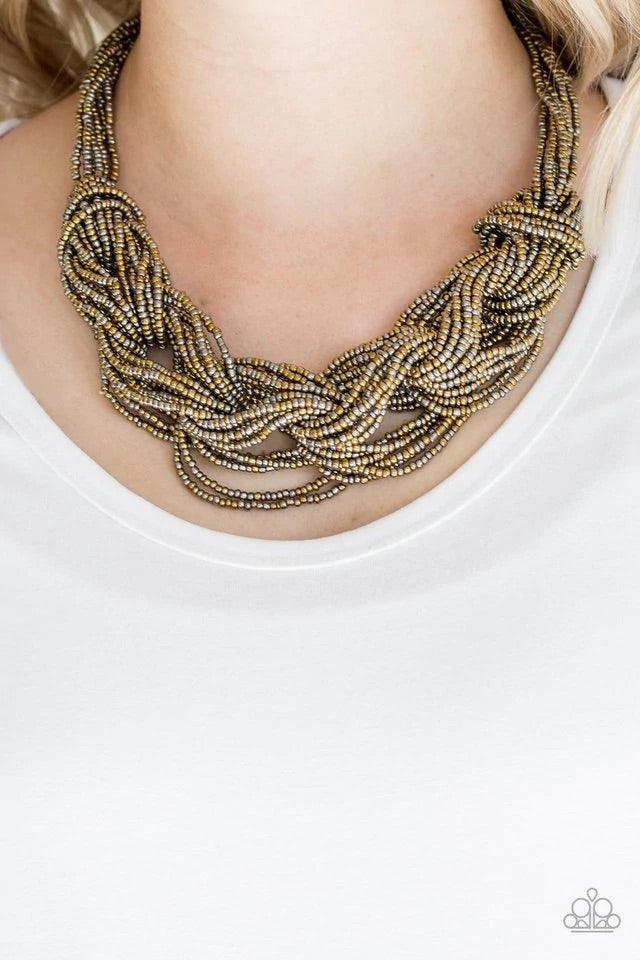 Paparazzi Accessories City Catwalk - Brass Brushed in a flashy finish, countless strands of brass and gunmetal seed beads weave into a bulky square braid below the collar for a glamorous look. Features an adjustable clasp closure. Jewelry