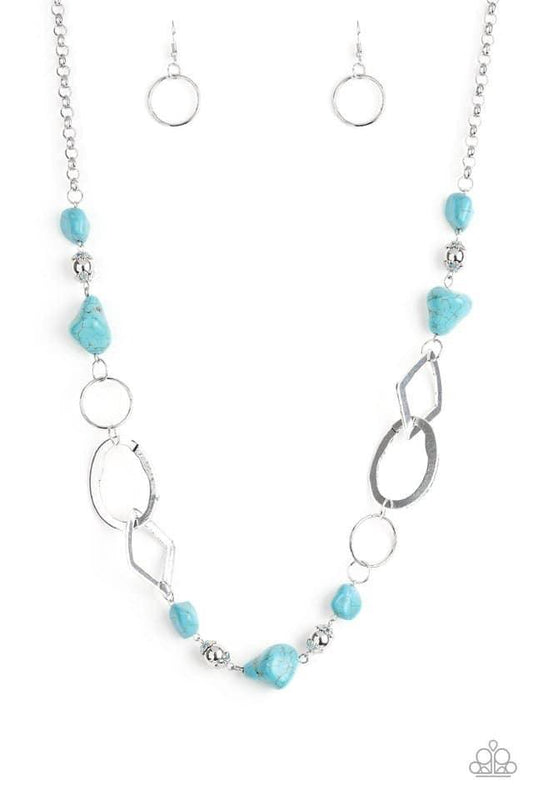 Paparazzi Accessories That’s TERRA-I fic! - Blue Bits of refreshing turquoise stones and ornate silver beading give way to asymmetrical silver frames. The mismatched frames drape across the chest, creating an earthy collision of rock and metal. Features a