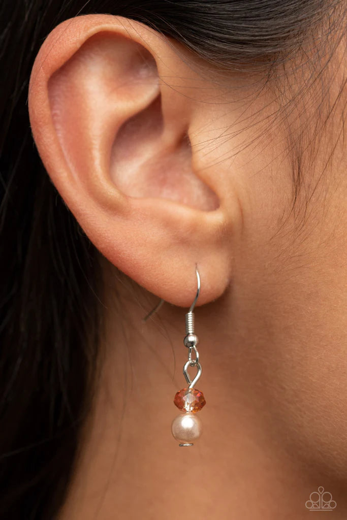 Paparazzi Accessories Secret Cottage - Brown An oversized silver disc stamped in a whimsical floral motif swings from the bottom of a pearly and crystal-like brown beaded chain, resulting in a romantic cottagecore inspired pendant. Features an adjustable