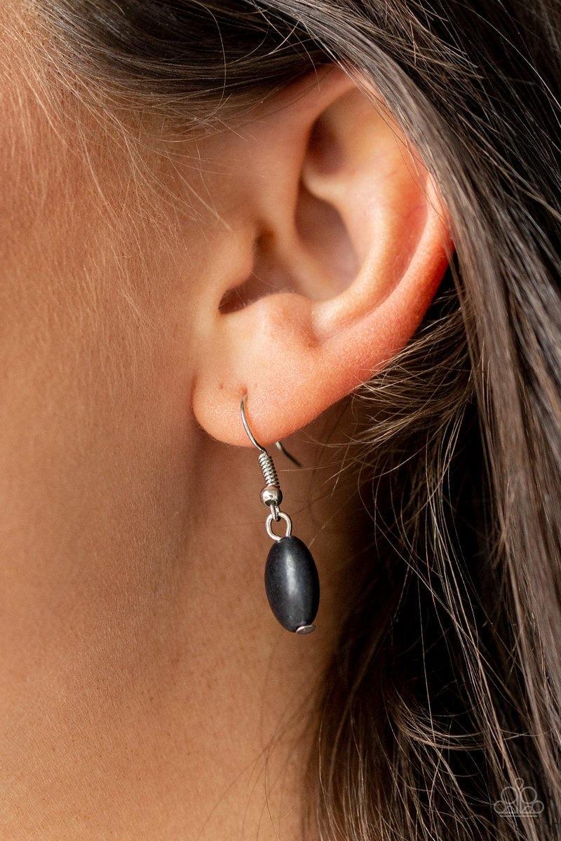 Paparazzi Accessories Rancho Roamer - Black Radiating with black stone accents, a dramatic floral pendant swings from the bottom of a lengthened silver chain for a seasonal look. Features an adjustable clasp closure. Jewelry