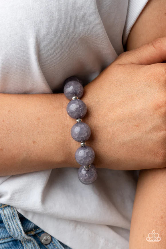 Paparazzi Accessories Arctic Affluence - Silver Infused with dainty silver accents, an oversized collection of crackly gray glass-like beads are threaded along stretchy bands around the wrist for an icy look. Sold as one individual bracelet. Bracelets