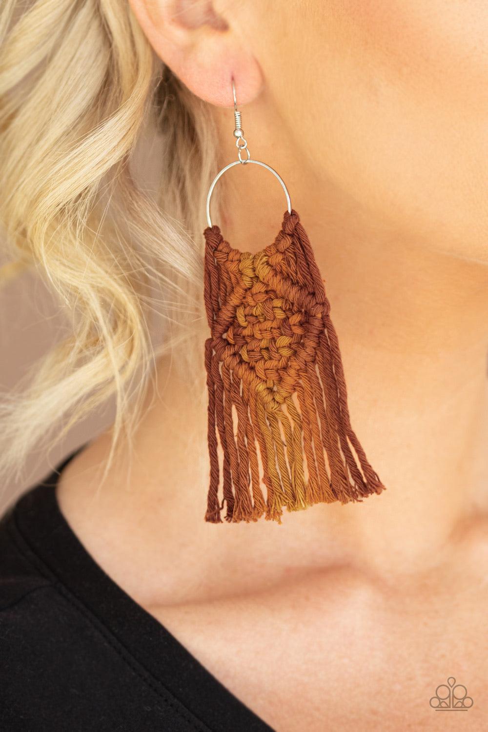 Paparazzi Accessories Macrame Rainbow - Brown An ombre of mixed brown and orange cording knots around the bottom of a dainty silver hoop, weaving into a colorful macrame fringe. Earring attaches to a standard fishhook fitting. Sold as one pair of earrings