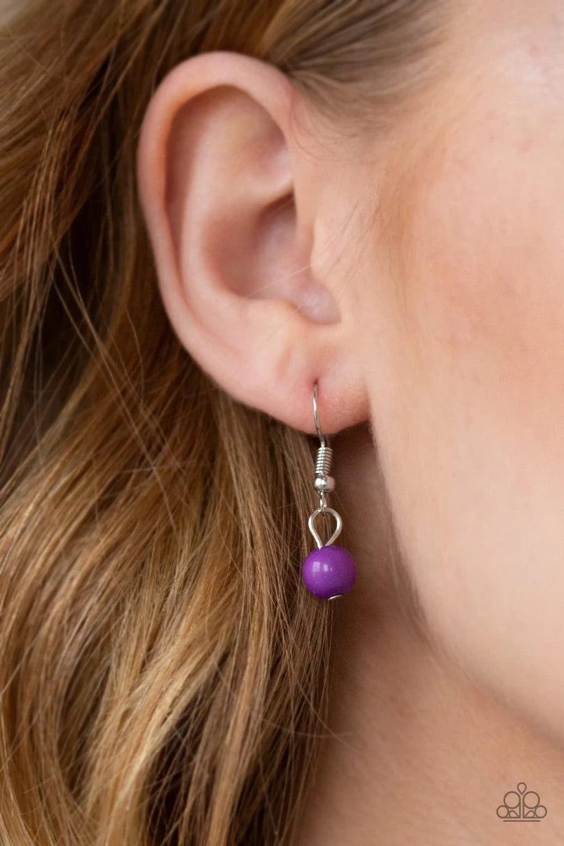 Paparazzi Accessories Miami Mojito - Purple Sections of shiny silver, polished purple, and glassy beads trickle along a shimmery silver chain along the chest for a flirtatious look. Features an adjustable clasp closure. Sold as one individual necklace. In