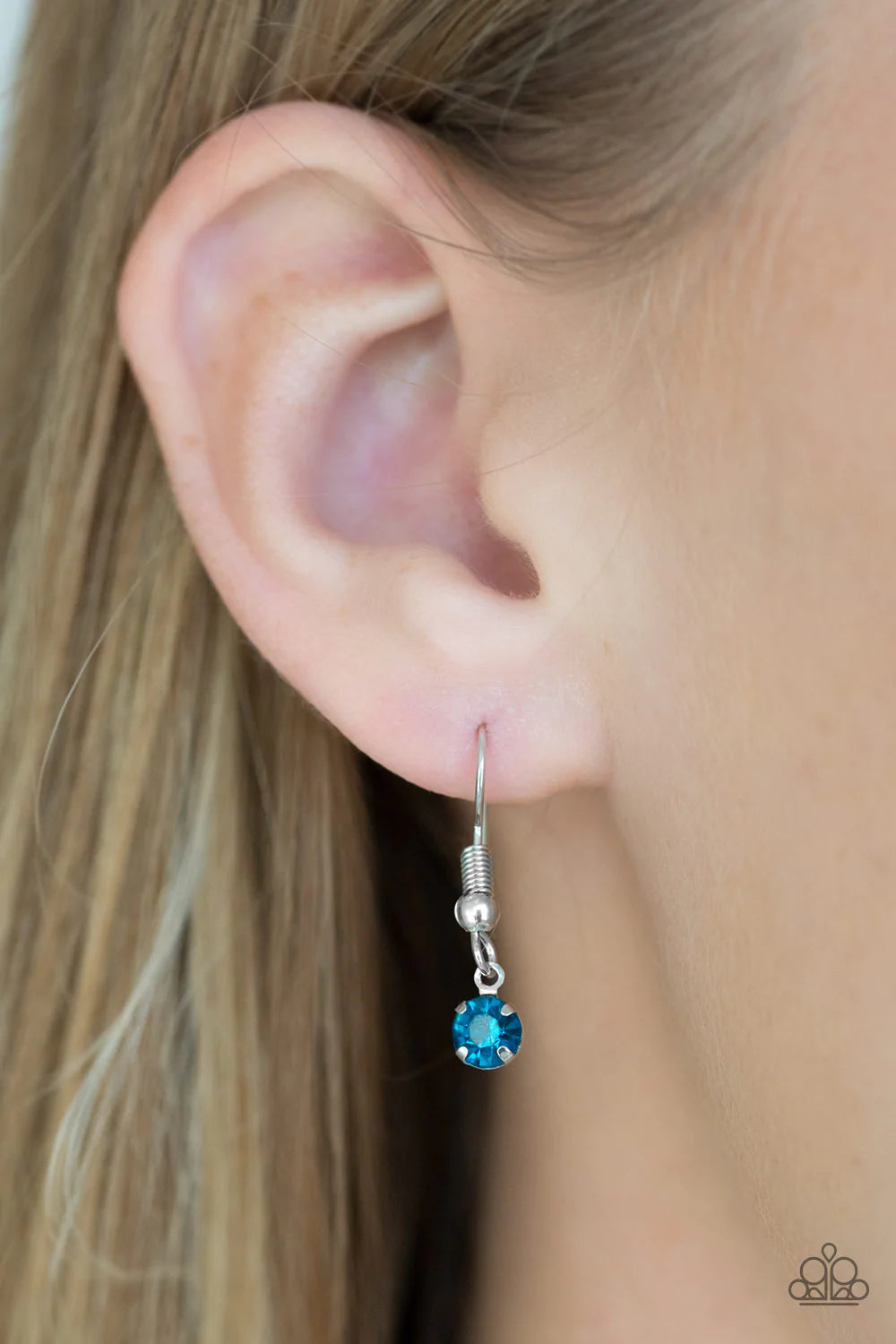 Paparazzi Accessories Glow and Grind - Blue A fringe of glittery blue rhinestones swings from the bottom of a bold silver chain below the collar for a fierce look. Features an adjustable clasp closure. Sold as one individual necklace. Includes one pair of