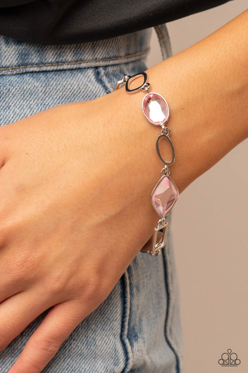 Paparazzi Accessories Dazzle for Days - Pink Oval, rectangular, and asymmetrical silver links connect with a trio of glittery pink gems around the wrist, resulting in an endless dazzle. Features an adjustable clasp closure. Sold as one individual bracelet