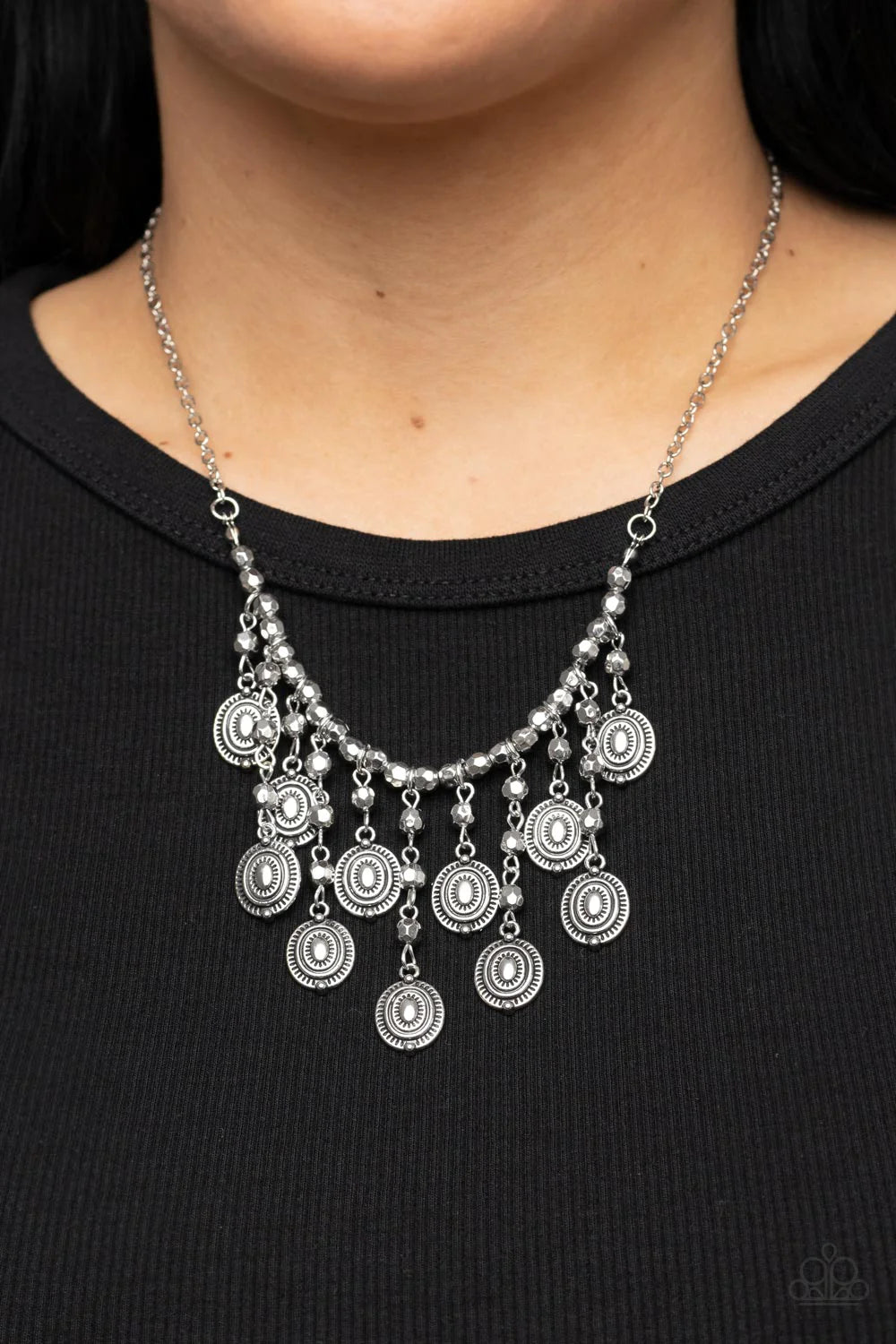 Paparazzi Accessories Leave it in the PASTURE - Silver Attached to an antiqued silver chain, a strand of faceted silver beads are threaded along an invisible wire below the collar. The gritty beads give way to a silver beaded tassel featuring textured sil