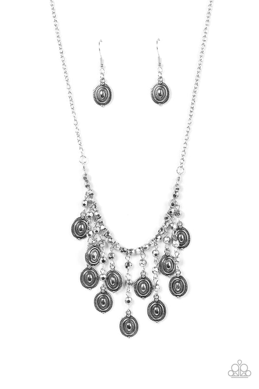 Paparazzi Accessories Leave it in the PASTURE - Silver Attached to an antiqued silver chain, a strand of faceted silver beads are threaded along an invisible wire below the collar. The gritty beads give way to a silver beaded tassel featuring textured sil