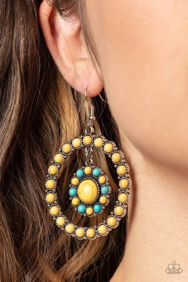Paparazzi Accessories Saguaro Sanctuary - Yellow Infused with studded silver fittings, a yellow and turquoise stone dotted floral frame swings from the top of a yellow stone dotted hoop for a whimsically rustic finish. Earring attaches to a standard fishh