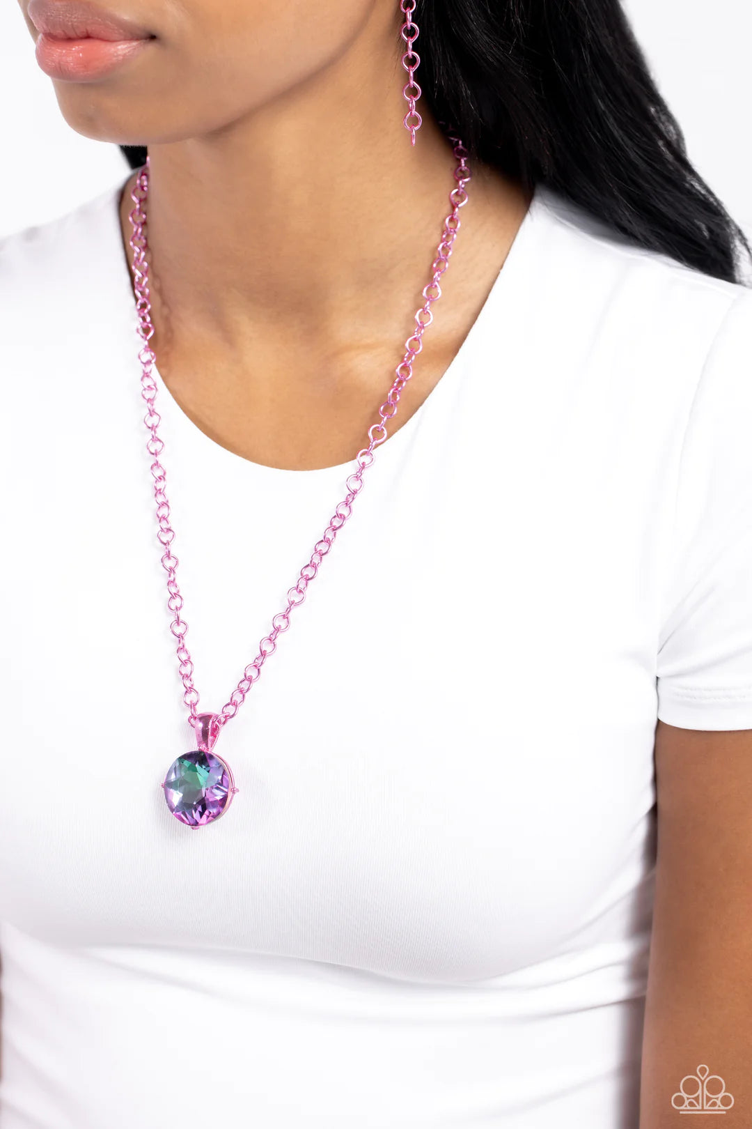 Paparazzi Accessories Las Vegas Dip - Pink Featuring a classic elongated chain in a vibrant pink hue, an oversized UV pendant in pink pronged fittings shimmers down the chest for a charismatic finish. Features an adjustable clasp closure. Jewelry