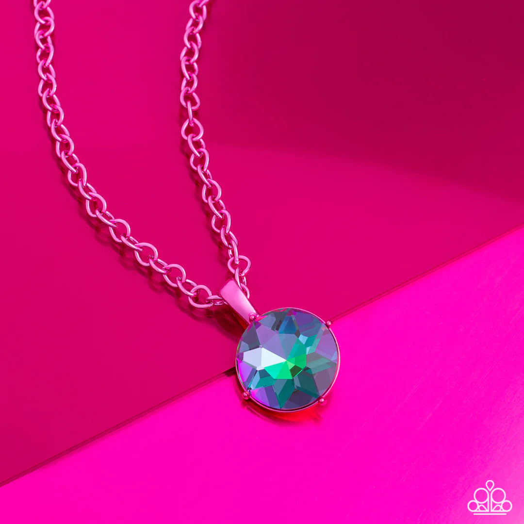 Paparazzi Accessories Las Vegas Dip - Pink Featuring a classic elongated chain in a vibrant pink hue, an oversized UV pendant in pink pronged fittings shimmers down the chest for a charismatic finish. Features an adjustable clasp closure. Jewelry