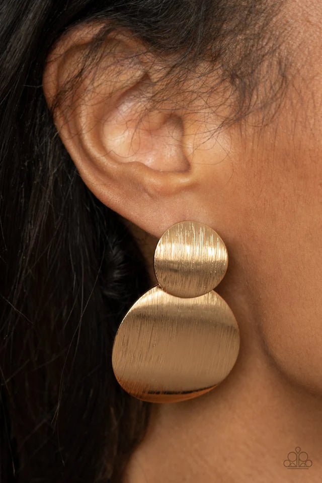 Paparazzi Accessories Here Today, GONG Tomorrow - Gold The perfect pair, these delicately scratched gold discs are forged into a stacked lure for an eye-catching metallic look. They attach to a standard post and earring fitting, so you can wear them with