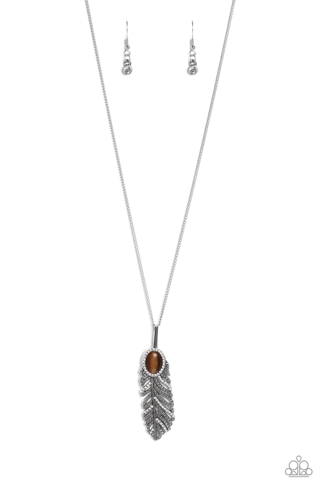 Paparazzi Accessories Pure QUILL-Power - Brown Bordered in a ring of glassy white rhinestones, a brown cat's eye stone adorns the top of a silver feather. Radiating with silver studs and brilliant white rhinestones, the lifelike pendant swings from the bo