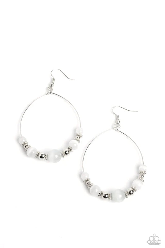 Paparazzi Accessories Cat’s Eye Charisma - White Silver beads, dainty silver wheel beads, and calming white cat's eye stones in varying sizes are threaded along a delicate teardrop-shaped silver wire resulting in an earthy lure. Earring attaches to a stan