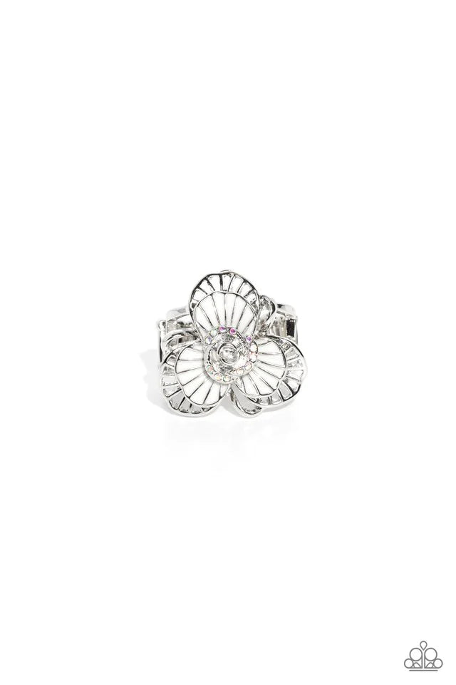 Paparazzi Accessories Tropical Trillium - White A white-petaled flower is layered with sleek, airy silver petals to create a dramatic centerpiece atop the finger. A silver rose bordered by a ring of iridescent rhinestones centers the design while adding u