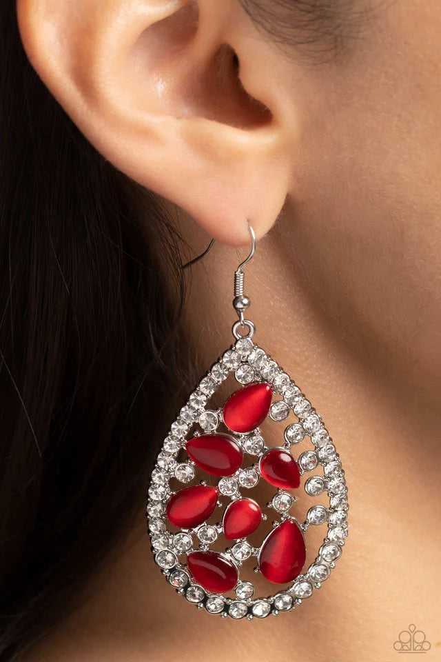 Paparazzi Accessories Cat’s Eye Class - Red Sporadically clustered against an airy, teardrop backdrop, red cat's eye stones shimmer and shine. An explosion of crystal white gems around the cat's eye stones and silver teardrop frame create additional light
