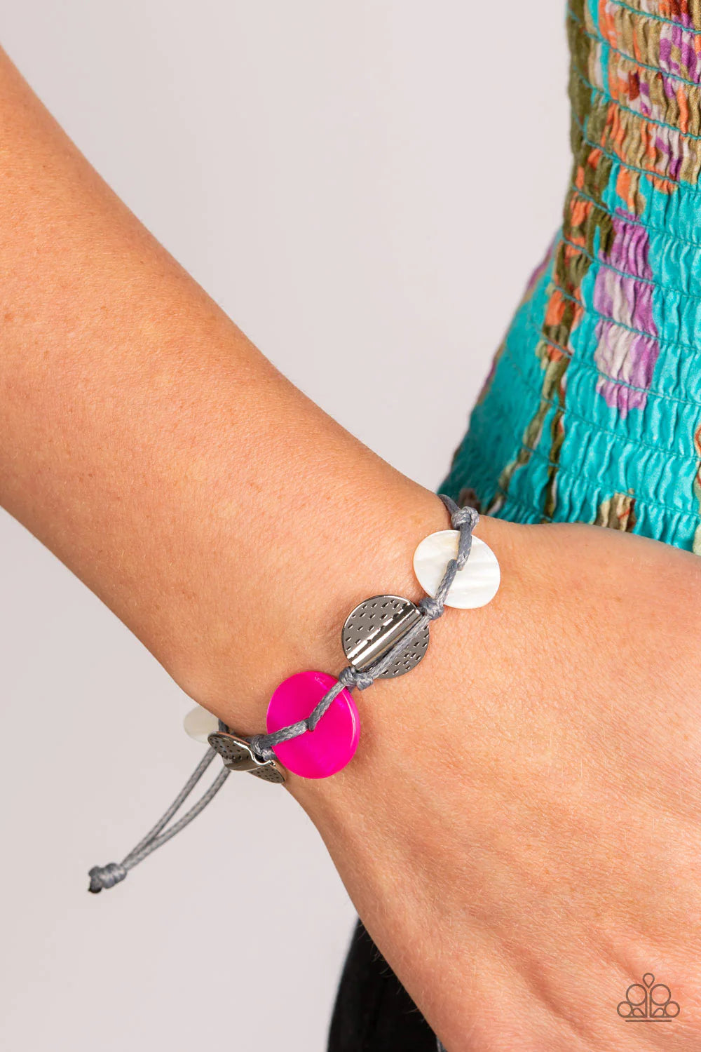 Paparazzi Accessories Shore Up - Pink Vibrant pink and white shells interlace with silver dotted, hammered discs to create a refined pop of color. Held together by soft gray cording, this piece will blend in with beaches near you! Features an adjustable s