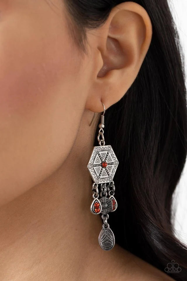 Paparazzi Accessories Dreamcatcher Delight - Orange ​Studded and stamped in tribal inspired patterns, a stacked hexagon frame gives way to a mismatched assortment of orange rhinestones and ornate silver frames for a dreamcatcher inspired result. Earring a