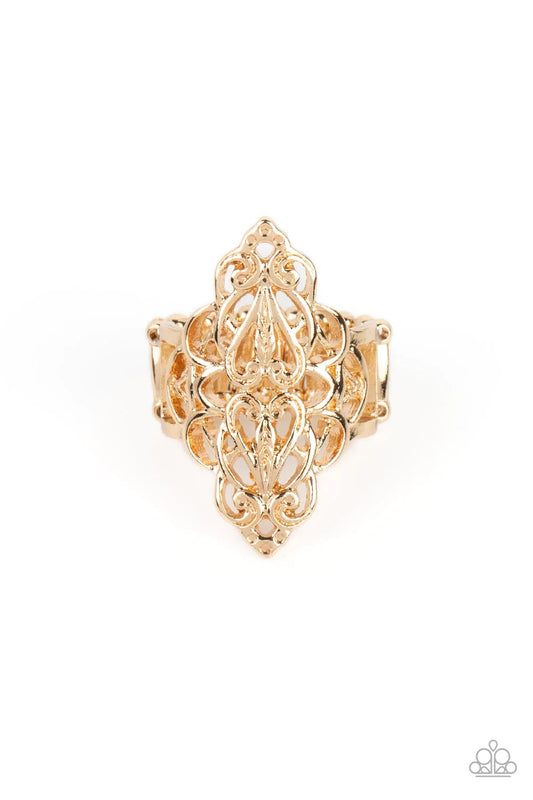 Paparazzi Accessories Curled Crown - Gold Shiny gold filigree curls into a marquise-shaped display atop the finger. The stenciled design allows the skin to peek beneath the airy pattern for a regal finish. Features a stretchy band for a flexible fit. Sold