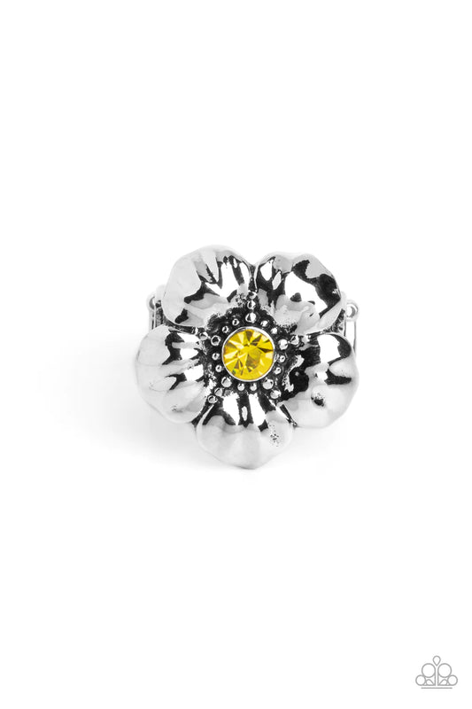 Paparazzi Accessories BLOOM BLOOM Pow - Yellow Dotted with dainty silver studs and a dainty citrine rhinestone center, folds of shiny silver curl into an oversized tropical flower for a whimsical dash of island inspiration atop the finger. Features a stre