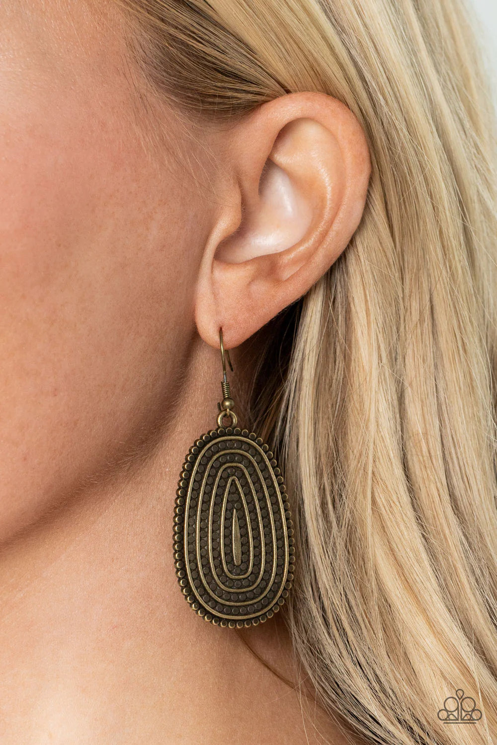 Paparazzi Accessories Desert Climate - Brass Rows of antiqued brass dotted texture radiate outward from an embossed center. The concentric lines create a rippling effect across the frame resulting in a rustic finish. Earring attaches to a standard fishhoo