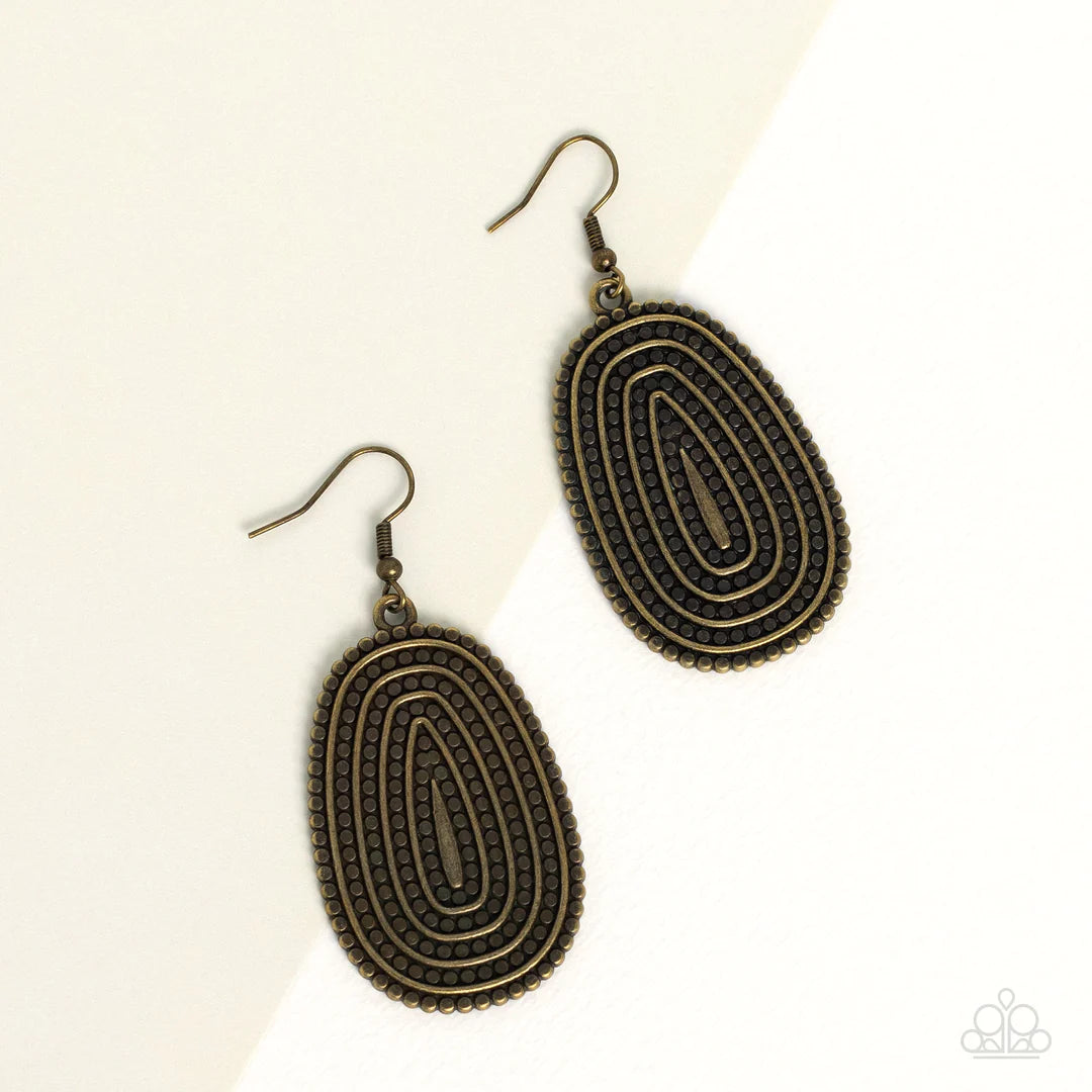 Paparazzi Accessories Desert Climate - Brass Rows of antiqued brass dotted texture radiate outward from an embossed center. The concentric lines create a rippling effect across the frame resulting in a rustic finish. Earring attaches to a standard fishhoo