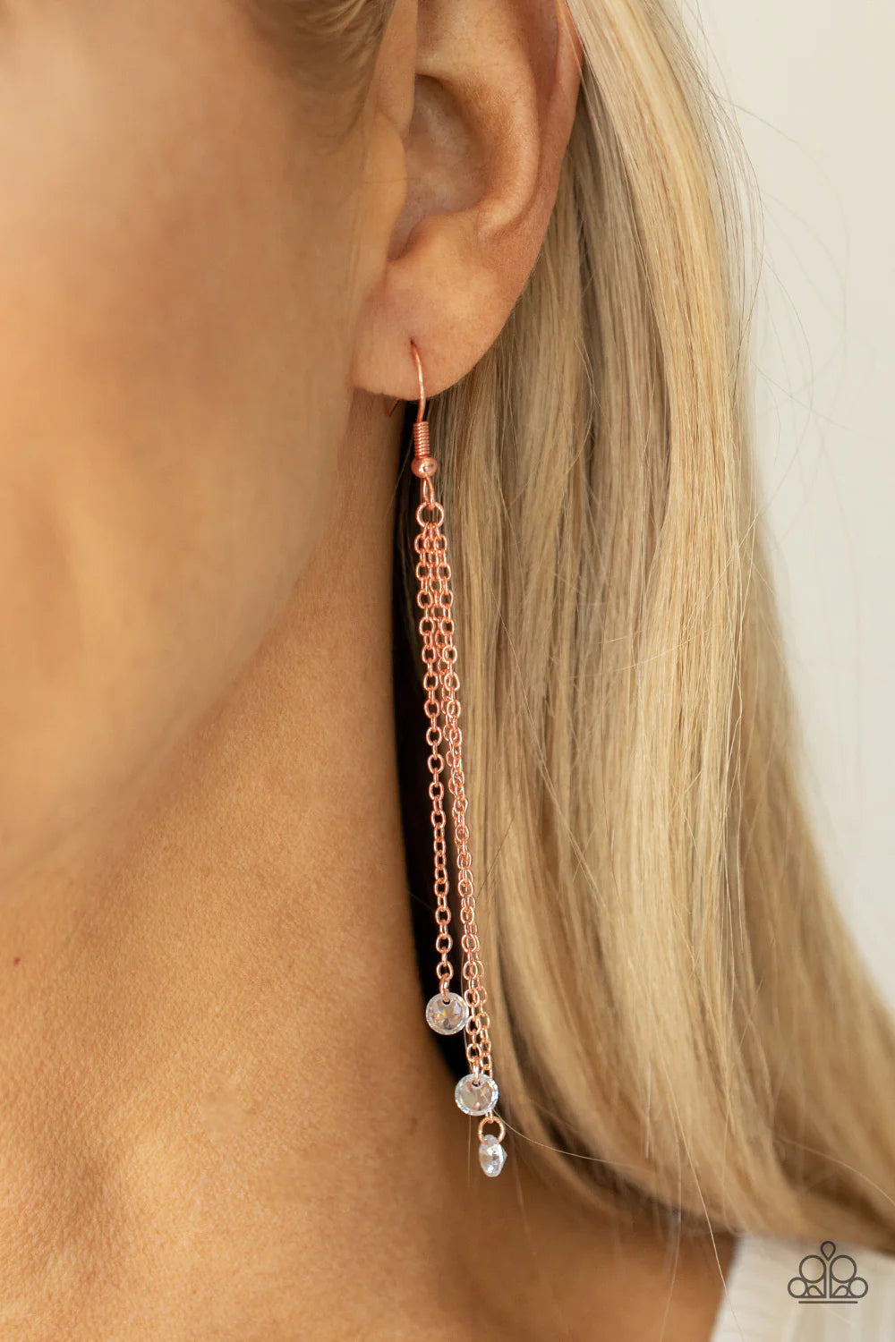 Paparazzi Accessories Divine Droplets - Copper A trio of dainty white rhinestones sparkle like dewdrops as they dangle from the ends of dainty copper chains for a refreshingly divine lure. Earring attaches to a standard fishhook fitting. Sold as one pair