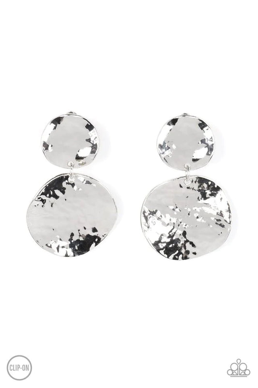 Paparazzi Accessories Rush Hour - Silver *Clip-On Hammered with high-sheen texture, warped silver discs delicately link into a bold monochromatic statement piece. Earring attaches to a standard clip-on fitting. Sold as one pair of clip-on earrings. Jewelr