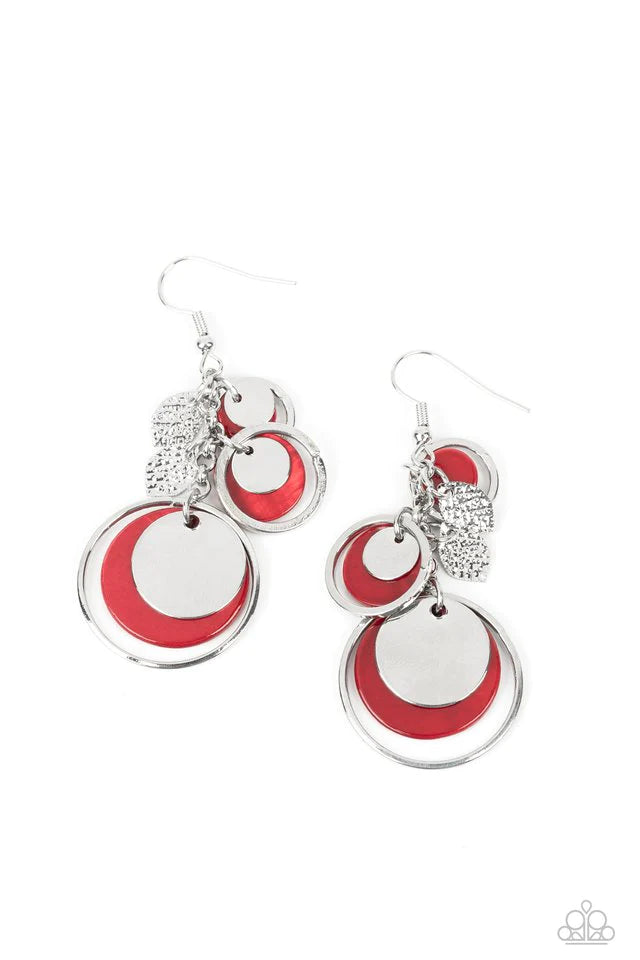 Paparazzi Accessories Saved by the SHELL - Red A colorful collection of red shell-like discs and dainty silver rings dances from the top of a fishhook setting, gradually increasing in size as they fall further down the ear. Connected to the top-most hoop,