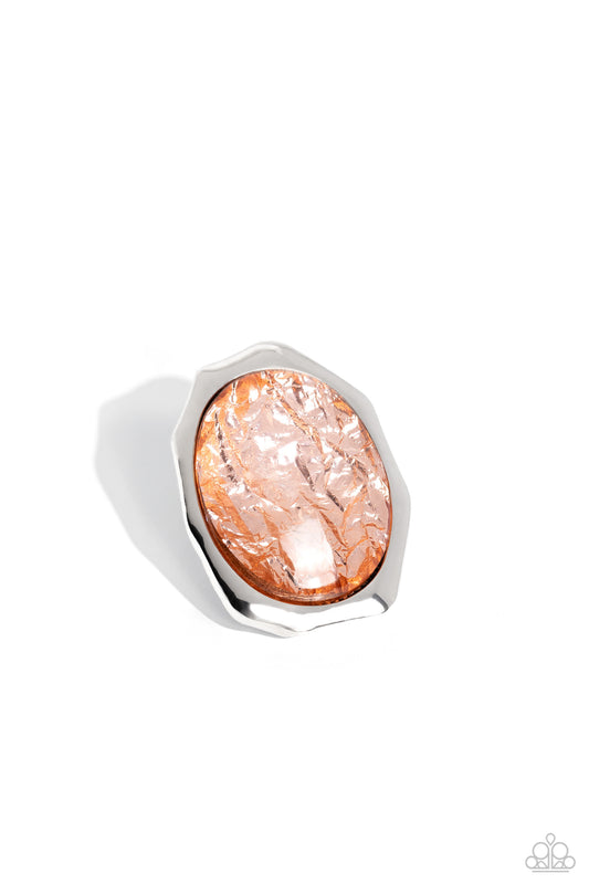 Paparazzi Accessories Wrapped Wardrobe - Orange Featuring a refracted shimmer, an oversized oval-cut, glossy orange gem sparkles from an asymmetrical silver frame for an edgy statement piece atop the finger. Features a stretchy band for a flexible fit. So