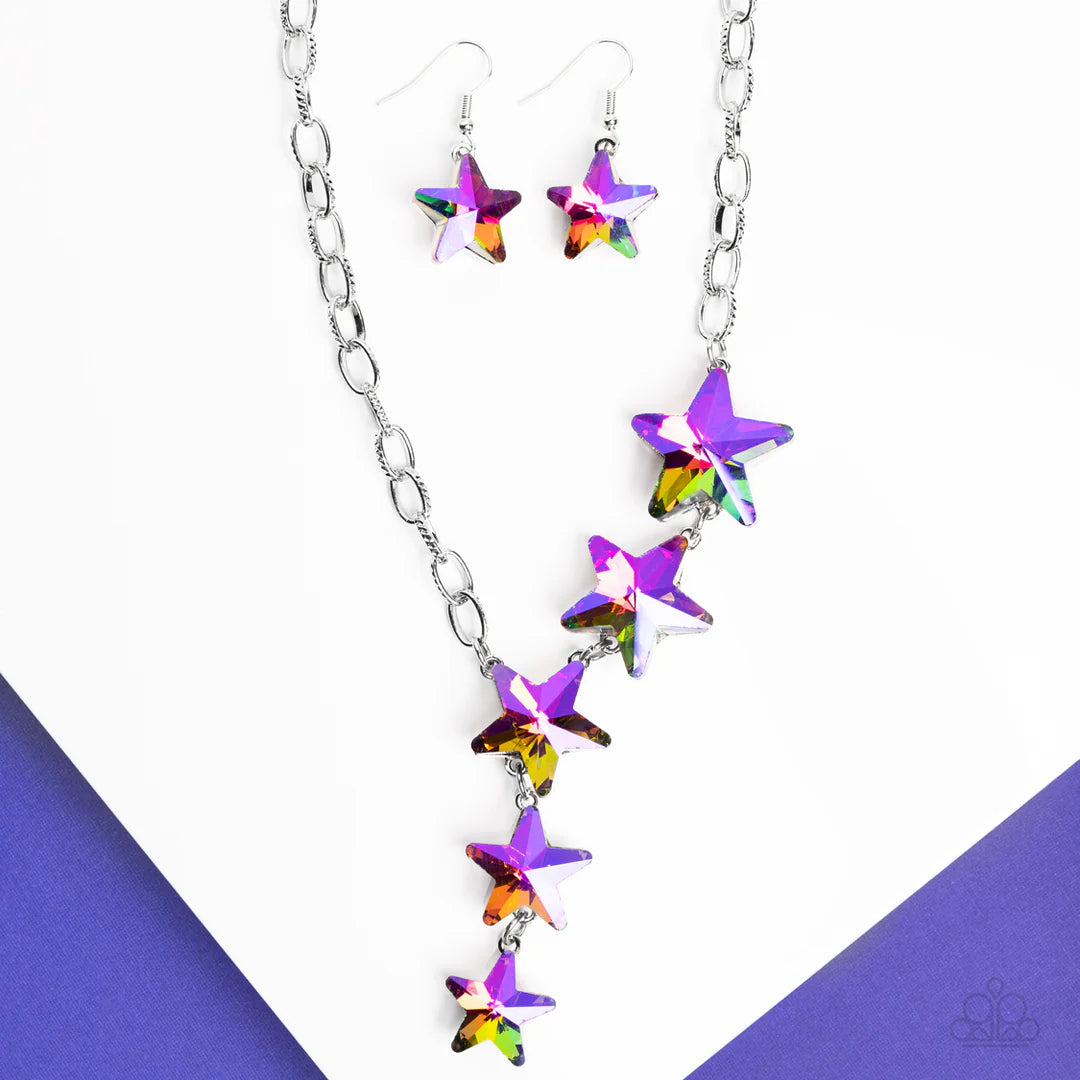 Paparazzi Accessories Star-Crossed Sparkle - Multi Textured silver hoops link together for a radiant finish across the neckline. Featuring a stellar UV shimmer, a collection of gem stars decrease in size as they cascade down the neckline in a diagonal pat