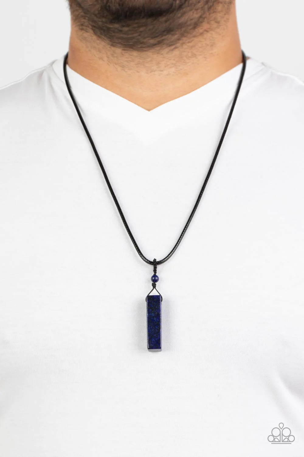 Paparazzi Accessories Comes Back ZEN-fold - Blue A rectangular lapis lazuli stone pendulum is knotted in place below a dainty lapis lazuli stone bead that glides along a shiny black cord below the collar, resulting in an earthy pendant. Features an adjust