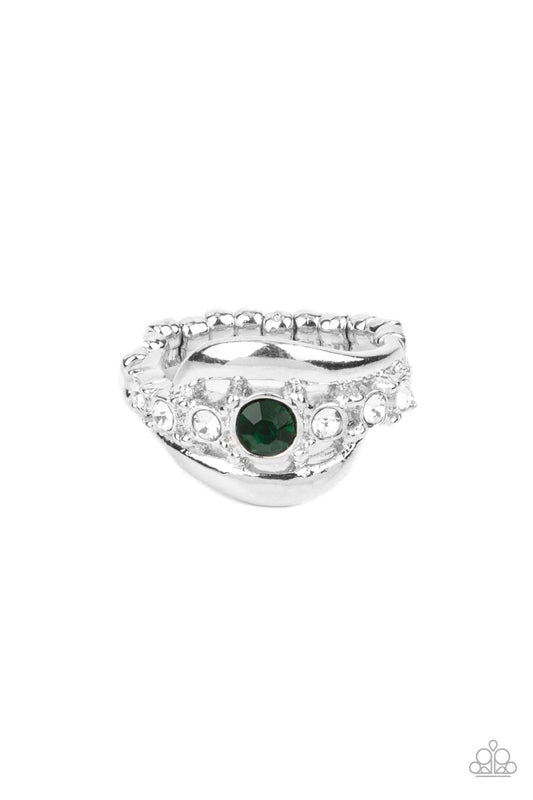 Paparazzi Accessories Graceful Gallantry - Green Swooping bands of silver nestle around a glassy band of dainty white rhinestones. A solitaire green rhinestone adorns the center of the glittery compilation, creating a timeless centerpiece atop the finger.