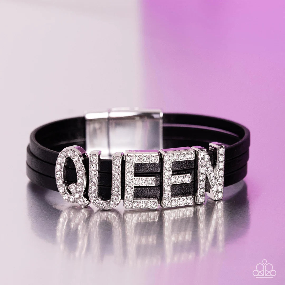 Paparazzi Accessories Queen of My Life - Black Three rows of black leather bands layer around the wrist. Dazzling rhinestones glisten atop the word "QUEEN" gracing the leather bands. Features a magnetic closure. Sold as one individual bracelet. Jewelry