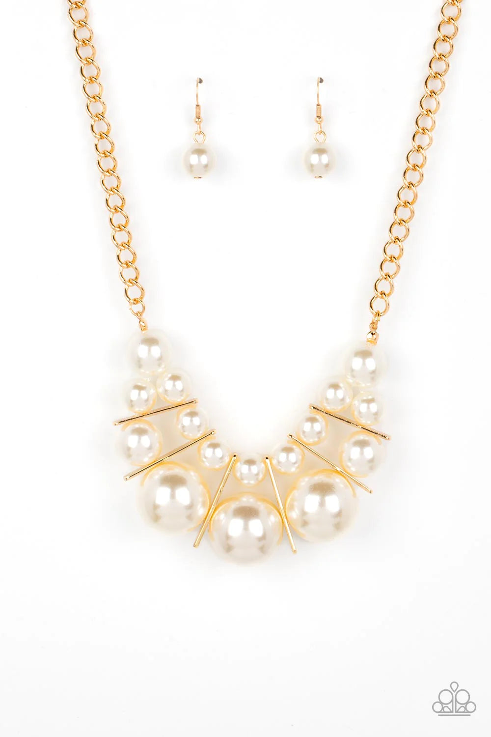 Paparazzi Accessories Challenge Accepted - Gold Separated by rectangular gold frames, bubbly rows of classic and oversized white pearls are threaded along invisible wires at the bottom of a chunky gold chain for an effervescent explosion below the collar.