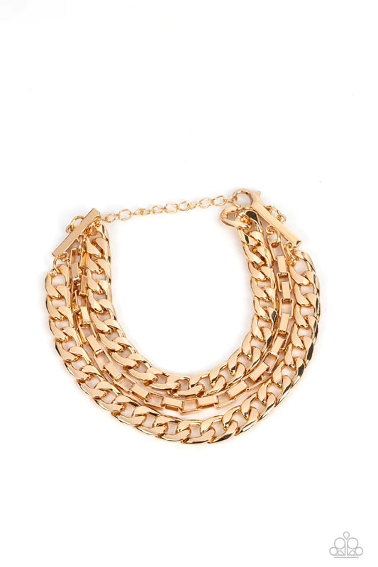 Paparazzi Accessories Heavy Duty - Gold Glistening gold curb and box chains wrap around the wrist for a grungy, industrial look. Features an adjustable clasp closure. Sold as one individual bracelet. Jewelry